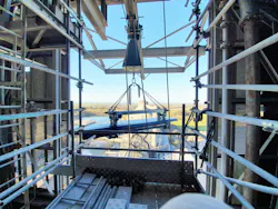 22,000-pound SWL wire-rope hoist being lifted into position. 22,000-pound SWL wire-rope hoist being lifted into position.