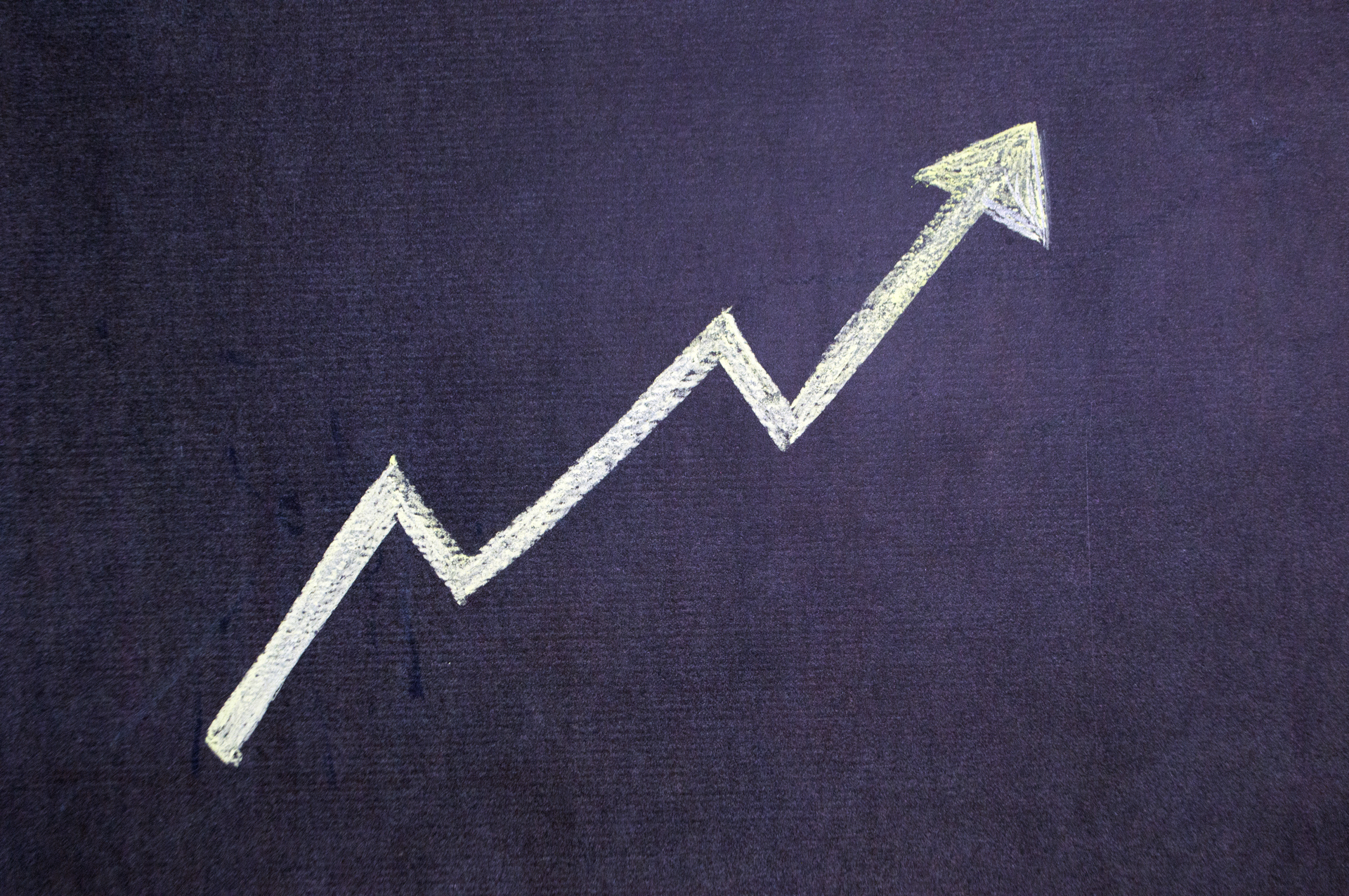 Business arrow trending up