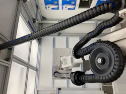 A three-dimensional triflex energy chain with a retraction system is installed on the robot. A three-dimensional triflex energy chain with a retraction system is installed on the robot.