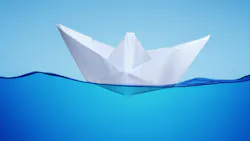 Paper toy ship on water Paper toy ship on water