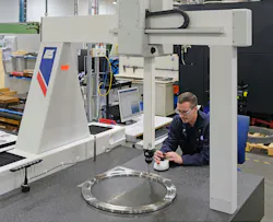 Close-up view of Dave Eldridge inspecting a fixture on the LK G90C 10.10.8. Close-up view of Dave Eldridge inspecting a fixture on the LK G90C 10.10.8.