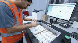 Kardex worker using the integrated Paccurate solution to pack an order. Kardex worker using the integrated Paccurate solution to pack an order.
