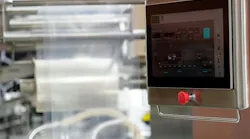 Control panel PC operates machinery in a modern manufacturing facility. Control panel PC operates machinery in a modern manufacturing facility.