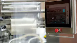 Control panel PC operates machinery in a modern manufacturing facility. Control panel PC operates machinery in a modern manufacturing facility.