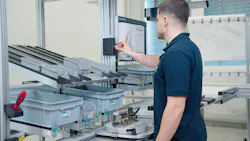 Worker at ergonomic workstation Worker at ergonomic workstation