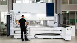 TruBend 3000 press brake bending machine with worker - full view TruBend 3000 press brake bending machine with worker - full view