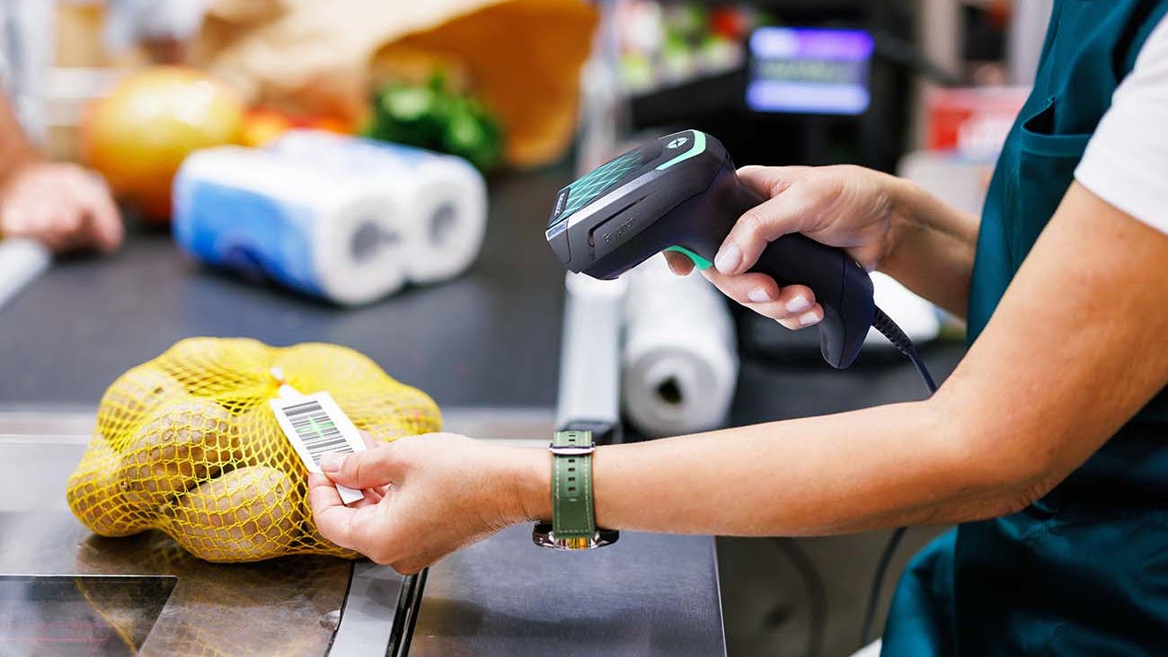 Gryphon 4600 Handheld Barcode Scanners used on lemons in checkout