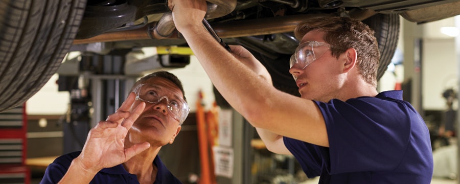 1673042948774 Mechanicandmaletraineeworkingunderneathcartogether