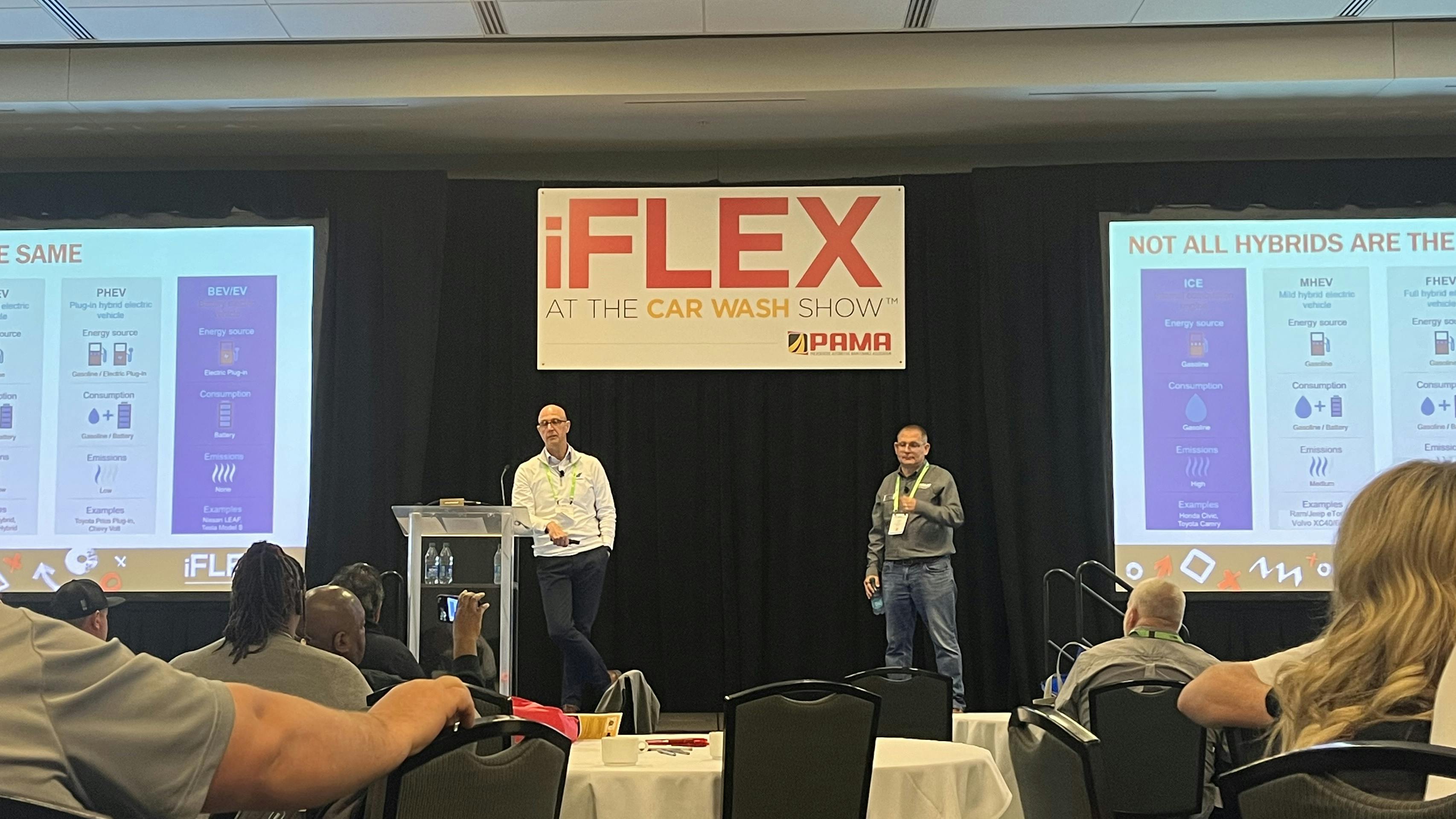 Michael Warholic of Valvoline Global (left) and Jason Lyon of AutoLube Express (right) during the hybrid vehicle maintenance session.