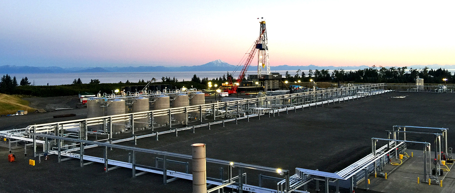BlueCrest Energy&rsquo;s drilling and production complex on Alaska&rsquo;s Southern Kenai Peninsula features an onshore extended reach rig, BlueCrest 1, that drills oil wells in Cosmopolitan field. Oil storage tanks also are shown (Fig 2).