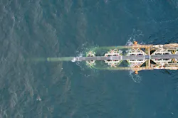 The pipeline can be seen from above as it is lowered from pipelay vessel Audacia's stinger and installed on the Baltic seafloor in German waters. The pipeline can be seen from above as it is lowered from pipelay vessel Audacia's stinger and installed on the Baltic seafloor in German waters.