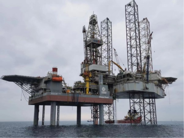 COSL&rsquo;s Strike rig positioned over the self-elevating WZ12-8E wellhead platform.