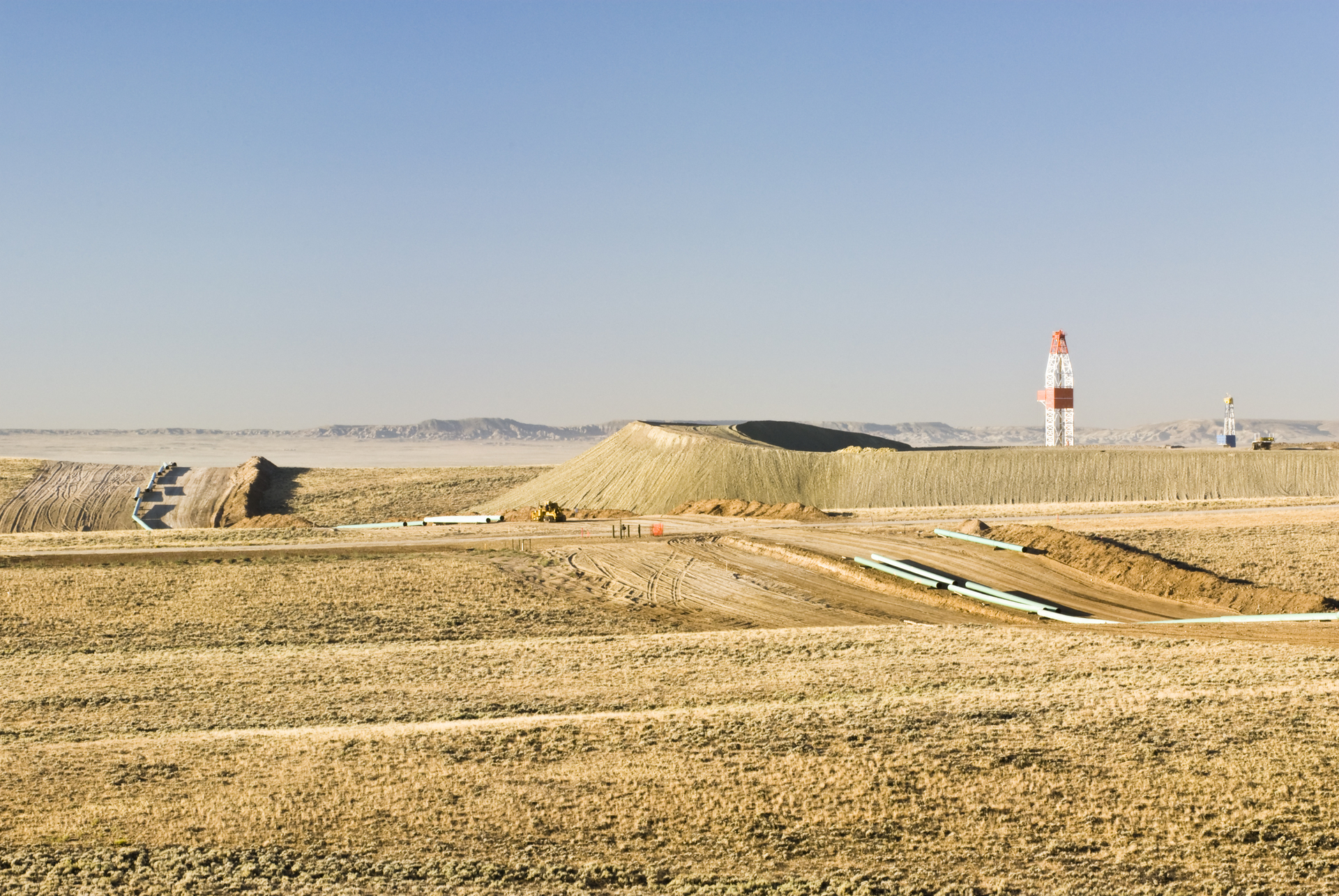 Pipeline construction through a natural gas field in Wyoming.