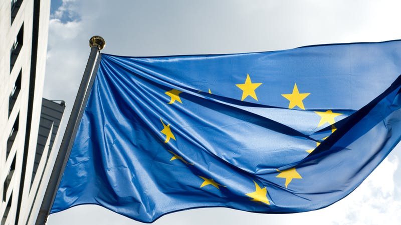 EU flag on sky background
