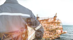 Double exposure of engineer man holding safety hat, offshore oil and gas platform background Double exposure of engineer man holding safety hat, offshore oil and gas platform background