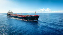 Aerial view of a heavy crude oil tanker traveling with speed over the ocean Aerial view of a heavy crude oil tanker traveling with speed over the ocean