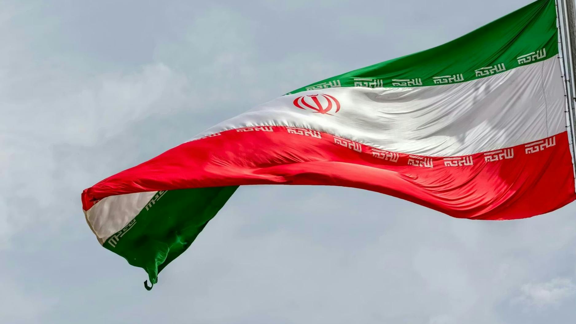 Iran flag blowing in wind