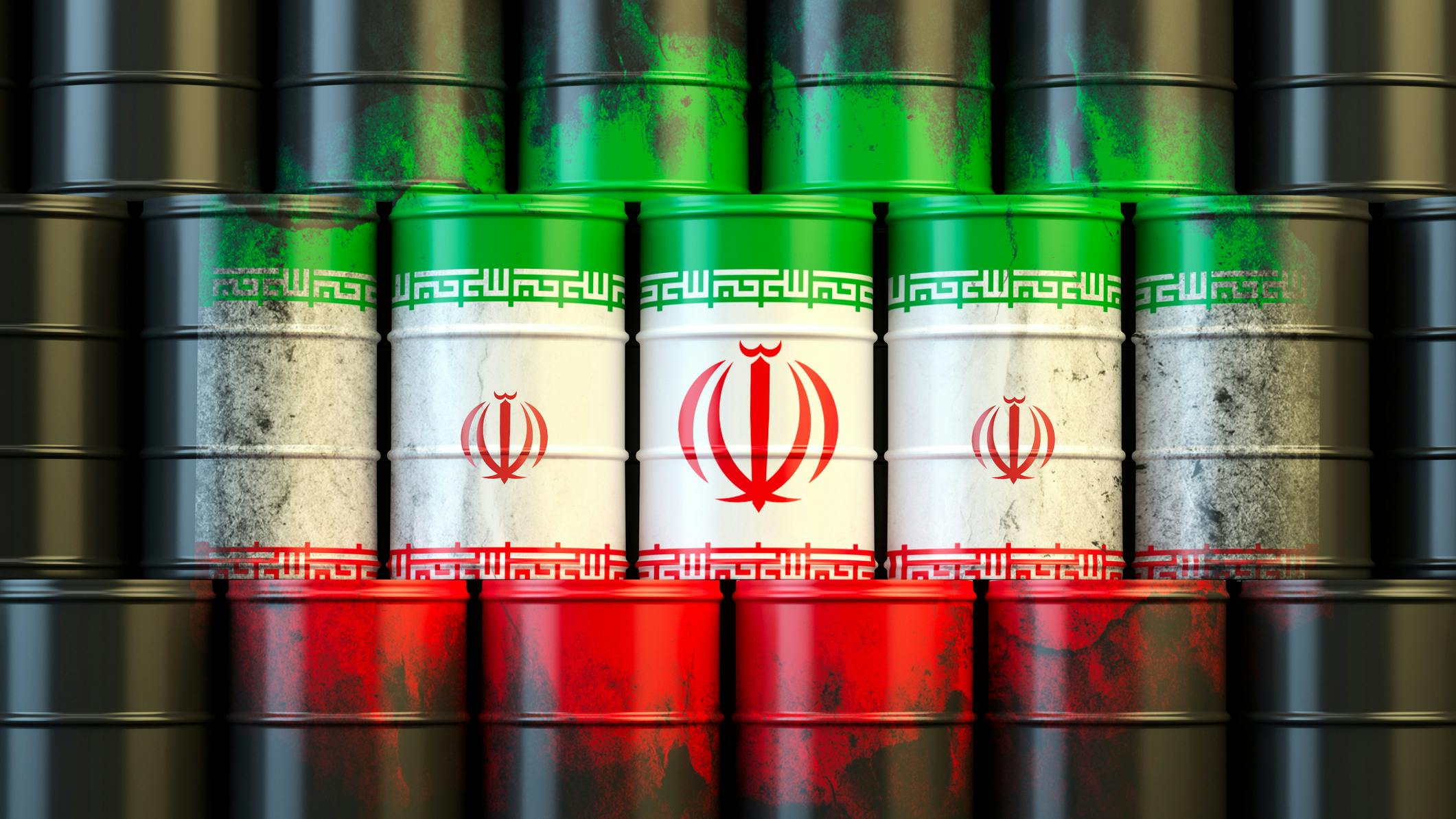 Stacked oil barrels painted with the colors and emblem of the Iranian flag