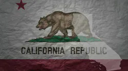 California flag and outline map of California on paper texture background California flag and outline map of California on paper texture background