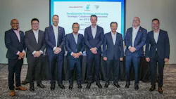 Men from Petronas, Valaris, and Halliburton stand together following signing of an agreement Men from Petronas, Valaris, and Halliburton stand together following signing of an agreement