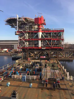 load-out of the 3,200-ton satellite platform topsides for Lukoil’s Korchagin oil field development load-out of the 3,200-ton satellite platform topsides for Lukoil’s Korchagin oil field development