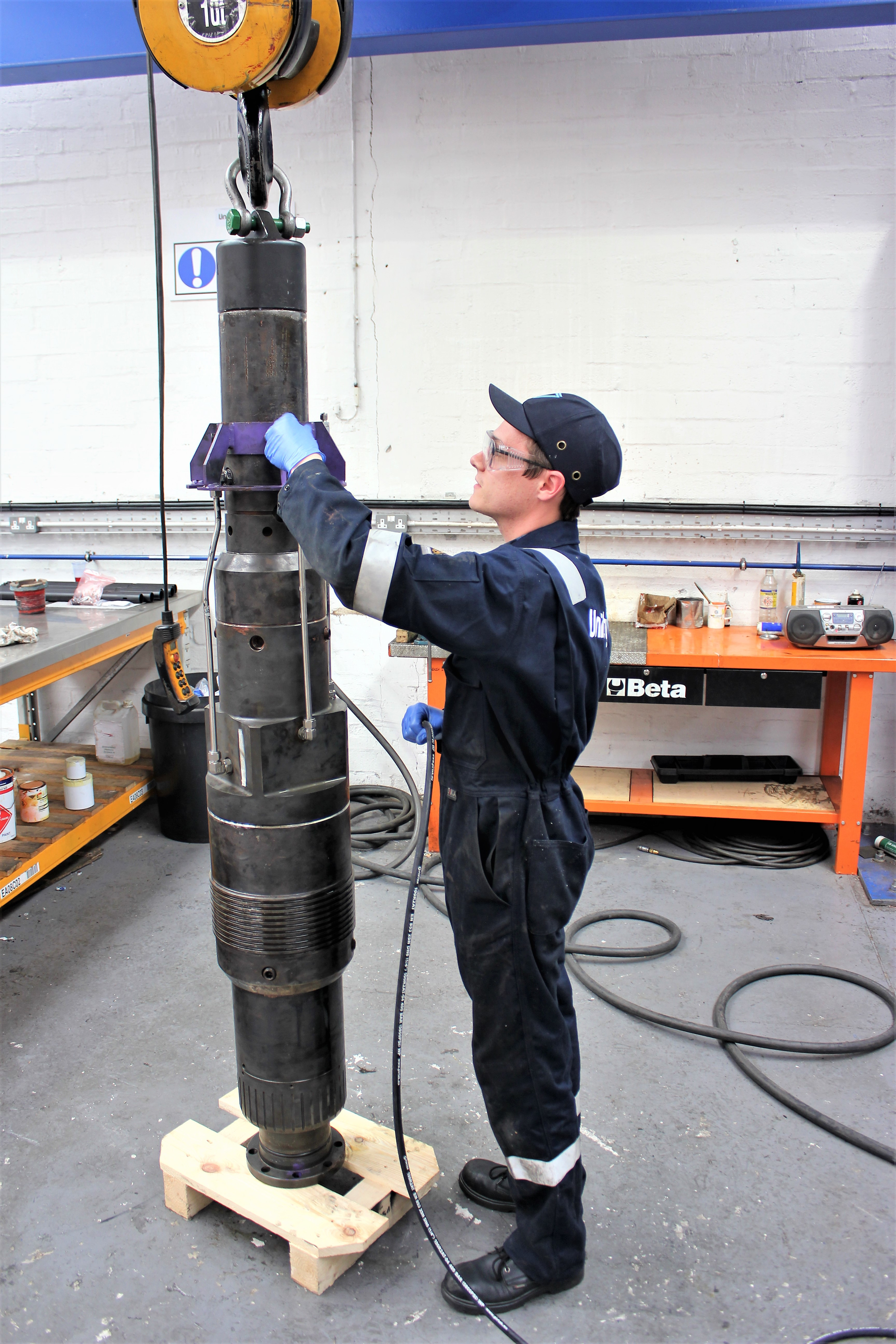 Temporary Abandonment Cap Test Tool is prepared for shipment in the workshop.