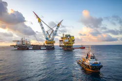 The S7000 preparing to rig up and lift the 11,000-t CA-KU-A1 topsides. The S7000 preparing to rig up and lift the 11,000-t CA-KU-A1 topsides.