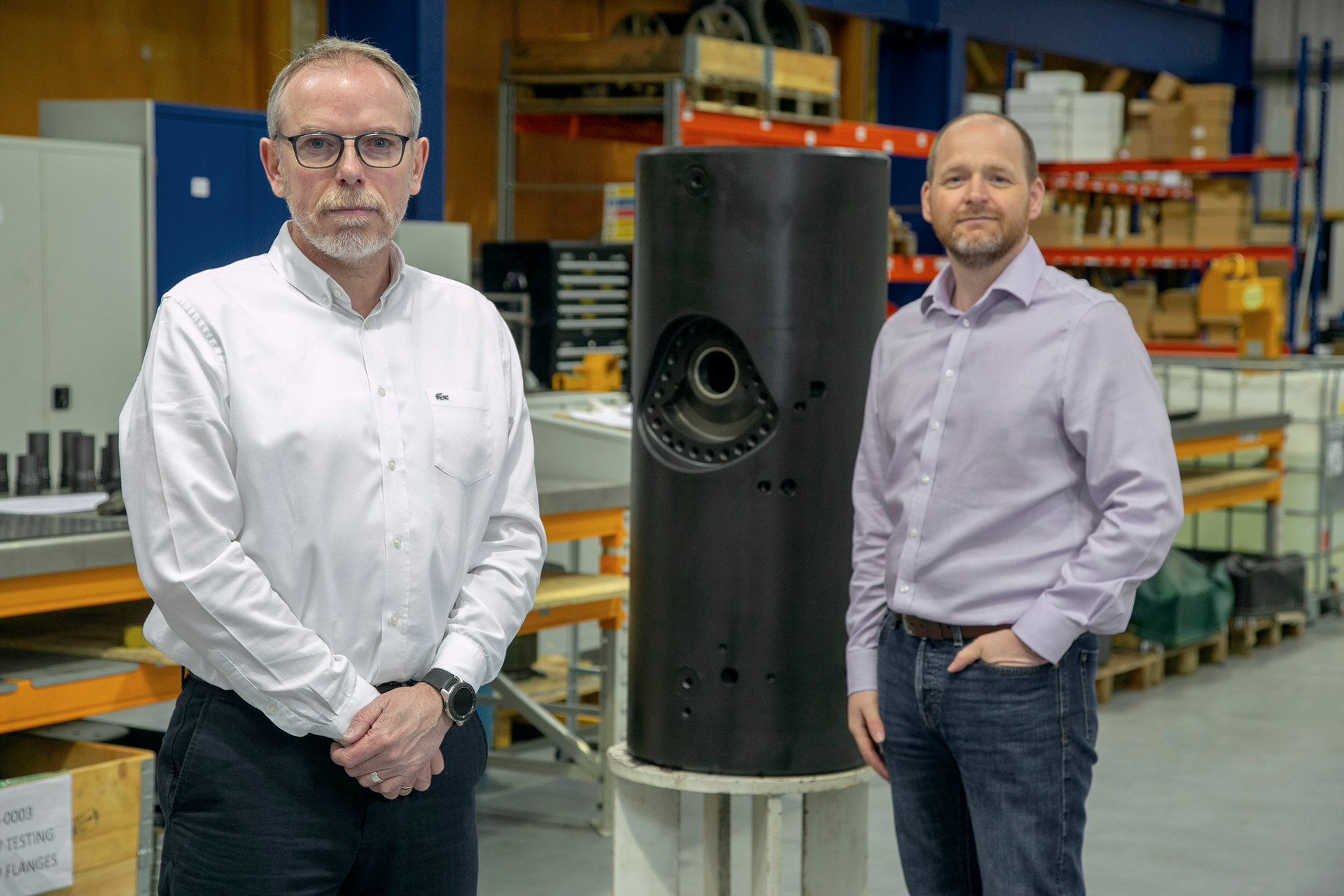 Gavin Cowie, managing director (L) and John Sangster, technical director (R) at Interventek, pictured with the Revolution PowerPlus shear and seal safety valve, which forms part of the subsea landing string system.