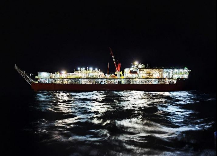 Night view of the production barge Ingenium II at the Apsara oil field development offshore Cambodia.
