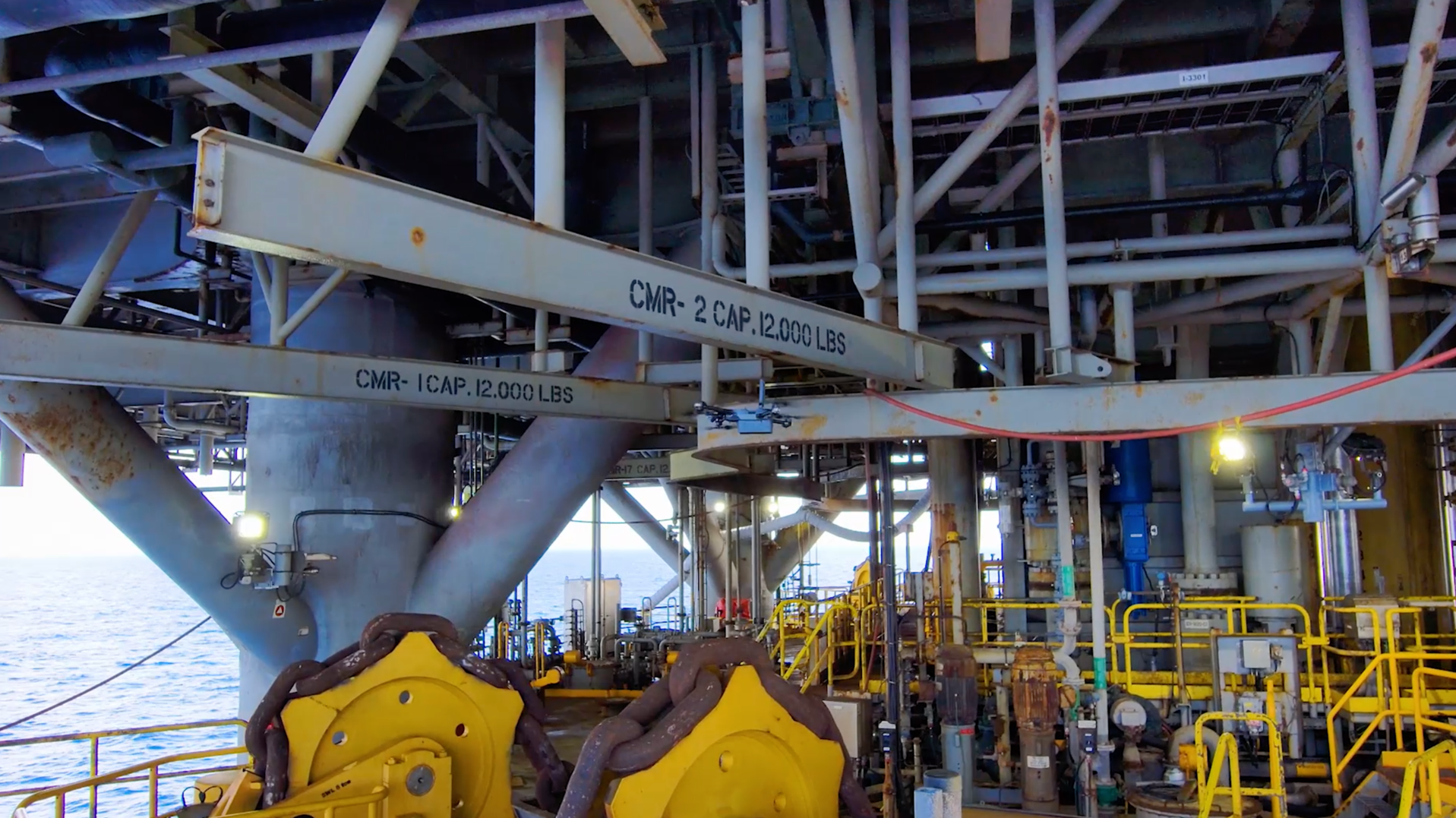 An autonomous drone inspects an offshore platform for an unnamed operator.