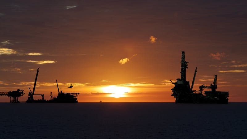 661e9f63aef586001ee697e0 Sunset Offshore Construction Dreamstime S 43762359