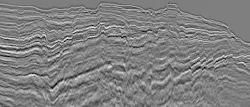 Fast-track Kirchoff pre-stack depth migration (KPSDM) full stack: Example line through the Nefertiti multi-client 3D volume. TGS says the fast-track data show encouraging imaging of the fault structures and potential traps in the Cretaceous and Jurassic section. Fast-track Kirchoff pre-stack depth migration (KPSDM) full stack: Example line through the Nefertiti multi-client 3D volume. TGS says the fast-track data show encouraging imaging of the fault structures and potential traps in the Cretaceous and Jurassic section.