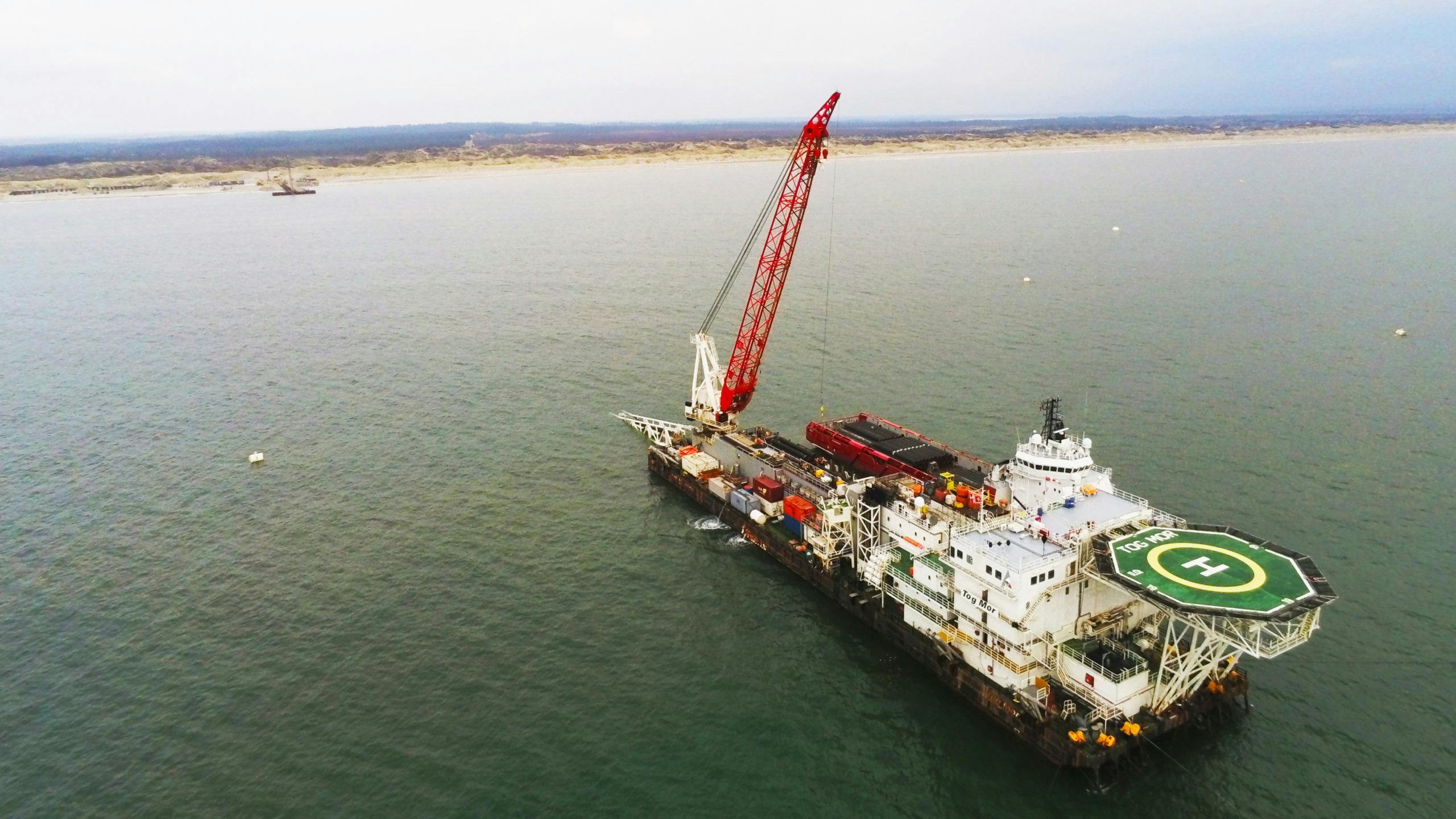 The Tog Mor flat-bottom, anchored barge was designed for shallow-water offshore construction activities.