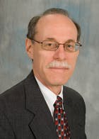 6970d32ed7d880998e6b7bc5 Spitzer Headshot