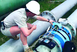 Figure 1. To perform external verification of an electromagnetic flowmeter, a technician connects a verification tool and a simulation box to the flowmeter without removing it from the pipe. All images courtesy of Endress+Hauser. Figure 1. To perform external verification of an electromagnetic flowmeter, a technician connects a verification tool and a simulation box to the flowmeter without removing it from the pipe. All images courtesy of Endress+Hauser.