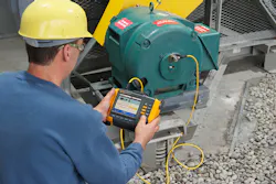A technician uses a vibration tester on an operational motor. All images courtesy of Fluke Corporation A technician uses a vibration tester on an operational motor. All images courtesy of Fluke Corporation