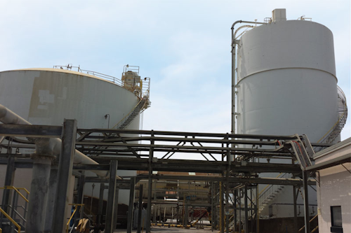 Image 1. Spar coming from the dryer is stored in one of the two silos before transfer to the hydrofluoric acid unit. This is the point where the company needed an accurate inventory measurement. All graphics courtesy of Chemours/Emerson