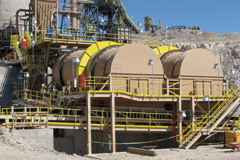 Two copper ore drums used for heap leaching. The drums are positioned at a slight incline to allow gravity to assist in moving ore fines through the drum. All graphics courtesy of FEECO International