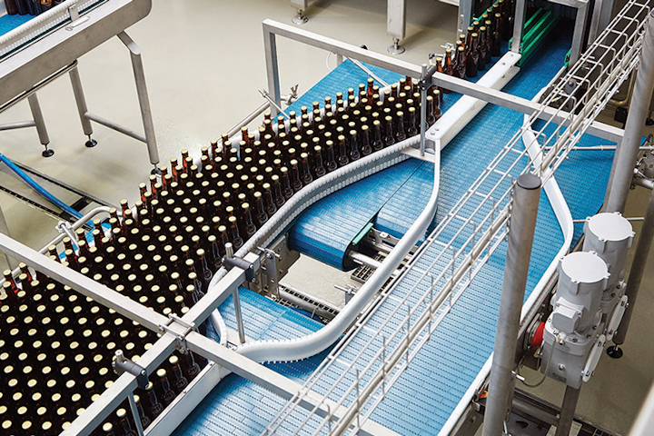 NORD 93.1 helical bevel gear units with NSD TUPH powering a washdown bottling conveyor.