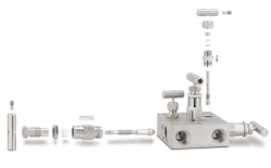 Figure 3. A manifold consists of multiple valves machined from a single block of metal to enable isolation for transmitter calibration or service. Figure 3. A manifold consists of multiple valves machined from a single block of metal to enable isolation for transmitter calibration or service.