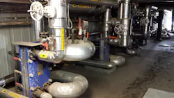 An oilseed installation uses three heat recovery loops to recirculate waste heat through a vertical plate heat exchanger to preheat the seeds. An oilseed installation uses three heat recovery loops to recirculate waste heat through a vertical plate heat exchanger to preheat the seeds.