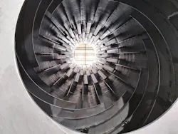 Three different flight designs, including advancing flights (spiraled), can be seen in this rotary dryer. Three different flight designs, including advancing flights (spiraled), can be seen in this rotary dryer.