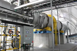 A FEECO Rotary Dryer with controls package (ball-and-tube knockers can also be seen on the unit). A FEECO Rotary Dryer with controls package (ball-and-tube knockers can also be seen on the unit).