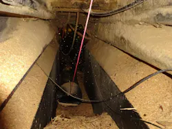 Figure 1: Heavy accumulations of wood particles and dust below a planer, representing a major fire hazard and possible explosion hazard. Proper dust collection system design can mitigate this obvious hazard. Figure 1: Heavy accumulations of wood particles and dust below a planer, representing a major fire hazard and possible explosion hazard. Proper dust collection system design can mitigate this obvious hazard.