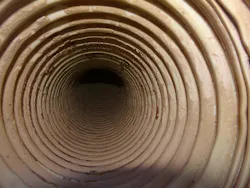 Figure 4: Hose interior with convolutions and material buildup. Figure 4: Hose interior with convolutions and material buildup.