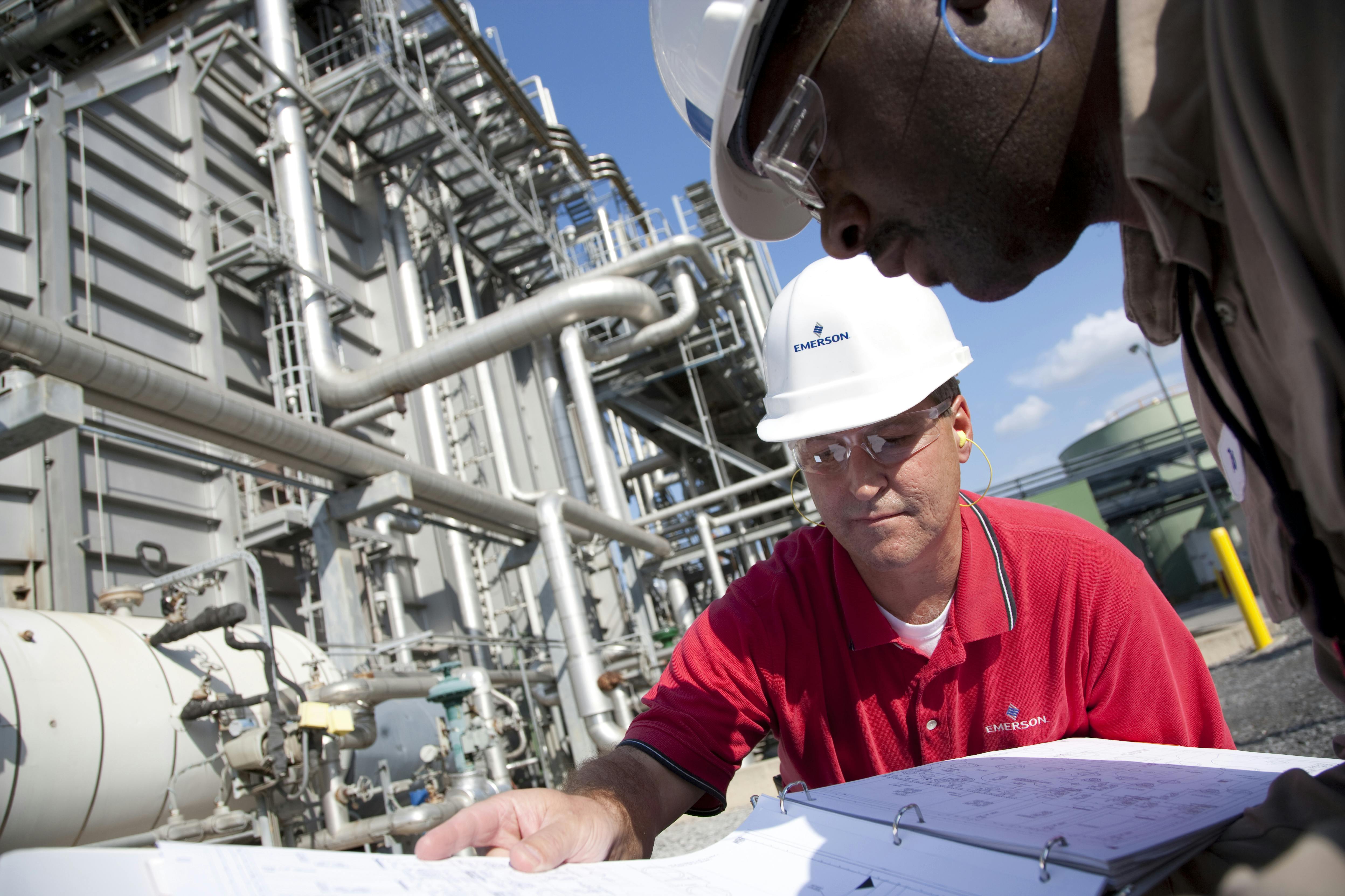 Figure 1: Emerson-trained technicians confirm the correct installation of control valves.