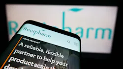 Recipharm logo and website on phone screen with logo in background Recipharm logo and website on phone screen with logo in background