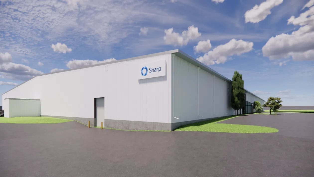 3D rendering of exterior of warehouse with Sharp logo on side of building
