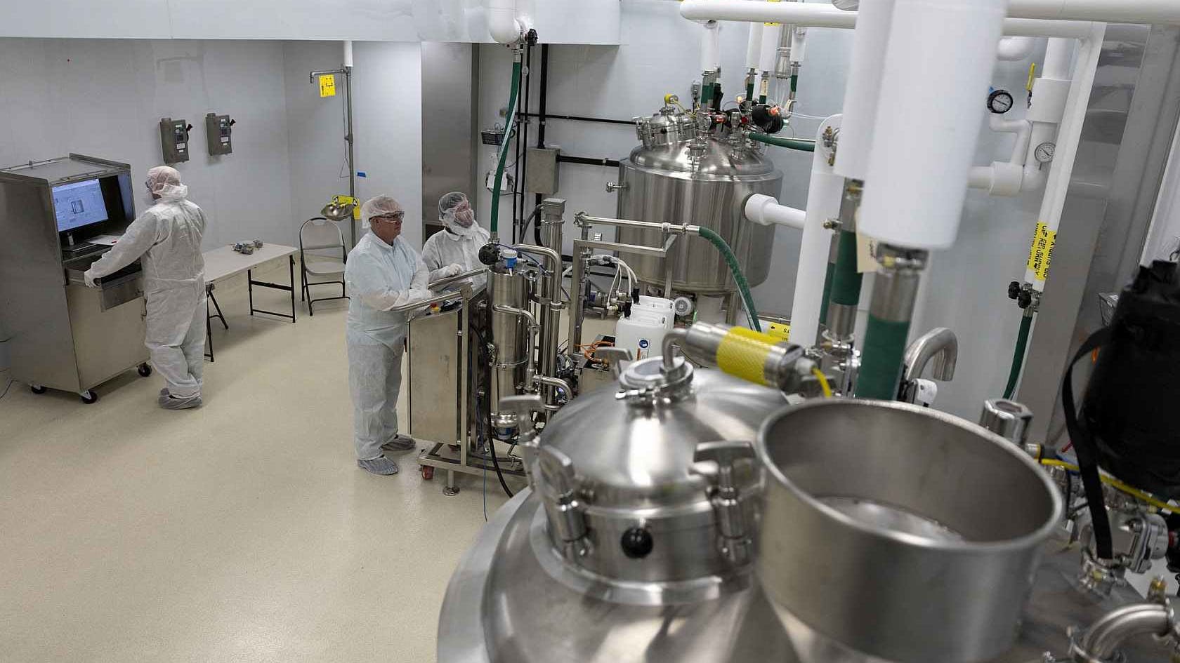 Workers in Kodak Pharma facility