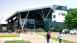 Workers walking outside to and from Sai Life Sciences building in Hyderabad, India Workers walking outside to and from Sai Life Sciences building in Hyderabad, India